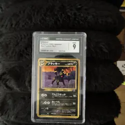 2000 POKEMON JPN NEO PREM FILE 2 UMBREON CGC 9 - Image 1
