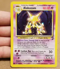 Pokemon TCG ALAKAZAM 1/130 ☆ HOLO WITH SWIRL 🌀 BASE SET 2 NM/LP - Image 1