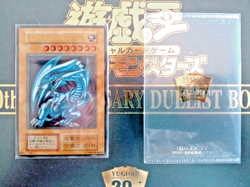 YuGiOh Stainless Steel Blue Eyes White Dragon 20th Anniversary - NM - Image 1