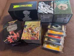 Pokemon TCG Stacking Tins filled with Online Code Cards and Energy cards - Image 1