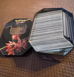 Pokemon TCG Stacking Tins filled with Online Code Cards and Energy cards - Image 2