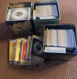Pokemon TCG Stacking Tins filled with Online Code Cards and Energy cards - Image 4