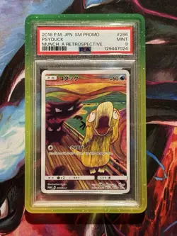 2018 Pokemon Japanese SM Promo Munch: A Retrospective #286 Psyduck PSA 9 - Image 1