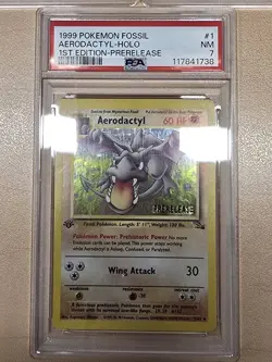 1999 POKEMON FOSSIL 1ST EDITION #1/62 AERODACTYL PRERELEASE PSA 7 - Image 1