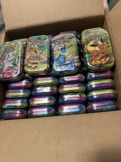 POKEMON PRISMATIC EVOLUTION TIN BOX 40 Tins. NEW SEALED - Image 2