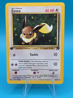 POKEMON EEVEE 55/82 1ST EDITION TEAM ROCKET - Image 1