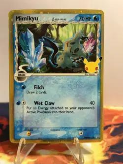 Pokemon TCG Mimikyu Delta Species Celebrations Promo Black Star SWSH136 - Image 1