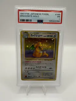1999 POKEMON FOSSIL #4 DRAGONITE-HOLO PSA 1 - Image 1