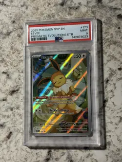 Eevee ETB Black Star Promo 173 PSA 9 MINT (Pokemon Prismatic Evolutions 2025) - Image 1
