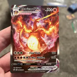 Pokemon TCG Charizard VMAX SWSH261 with matching soft case - Image 1