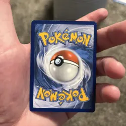 Pokemon TCG Charizard VMAX SWSH261 with matching soft case - Image 5