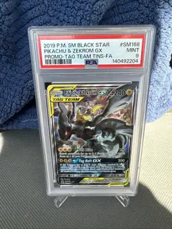 2019 Pokemon TCG SM Black Star Pikachu & Zekrom GX Tag Team Promo SM168 PSA 9 - Image 1