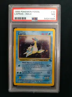 Graded PSA 7 1999 Pokemon Fossil - Lapras - HOLO #10 - Image 1