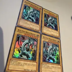 YUGIOH BLUE-EYES WHITE DRAGON SKE-001 SUPER X4 HP/CREASES - Image 1