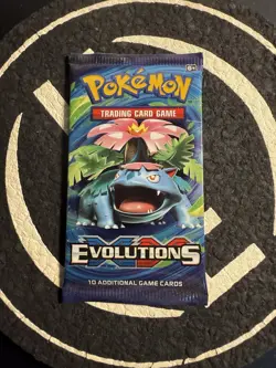 New Factory Sealed Pokemon Booster Pack XY Evolutions In Hand - Image 1