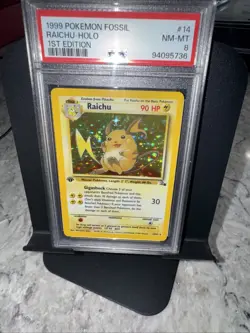 1999 POKEMON FOSSIL 1ST EDITION #14 RAICHU-HOLO - Image 1