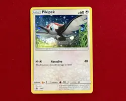 Pokemon Card Black Star Promo Holographic Pikipek SM07 NM MINT - Image 1