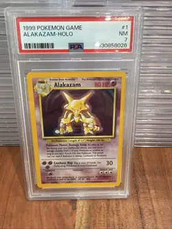 1999 Pokemon Base Set Unlimited Alakazam #1 - Holo PSA 7 - Image 1