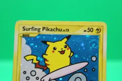 Surfing Pikachu 114/111 Rising Rivals Pokemon Card Holo Secret Rare Swirl HP - Image 2