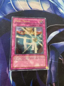 Yugioh! Hero Medal STON-EN050 Ultimate Rare 1st Edition NM - Image 1