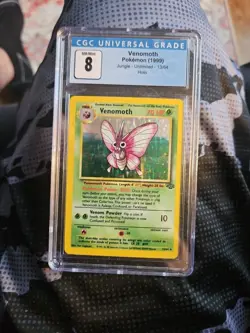 Pokemon Cards 1999 Jungle Venomoth Holo 13/64 CGC 8 NM/Mint - Image 1