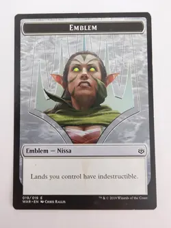 Emblem - Nissa, Who Shakes the World War of the Spark • Regular MTG - Image 1