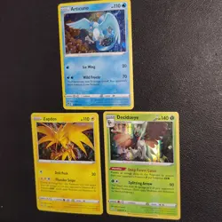 Lot Of 3 Pokemon Holo Cards: Zapdos, Articuno, And Decidueye - Image 1