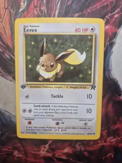 POKEMON EEVEE 55/82 1ST EDITION TEAM ROCKET MP - Image 1
