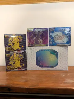Pokemon sealed ETB and UPC lot, Surging, Stellar, Sword & Shield, Terapagos - Image 1