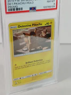 Detective Pikachu - Cosmo Holo - SM Black Star Promo - Pokemon #SM194 - PSA 8 - Image 2