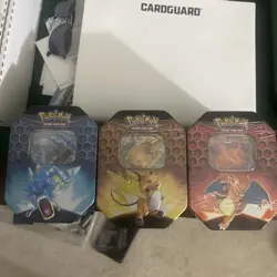 Pokemon Hidden Fates GX Tins Art Set of 3 Full Sealed Charizard Raichu Gyarados - Image 1