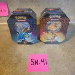 Lot Of 2 Sealed Pokemon Hidden Fates Tins - Set Of Gyarados And Raichu - Image 1
