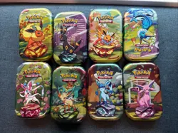 Set of Prismatic Evolutions EMPTY Mini Tins With Pokemon art card/coin- Lot Of 8 - Image 1
