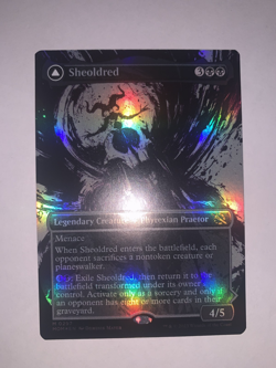 Sheoldred (Showcase) March of the Machine Foil - Image 1
