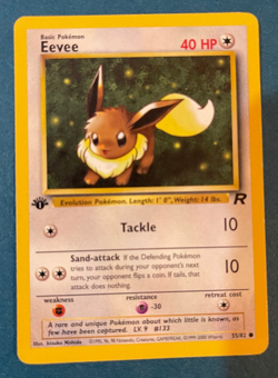Pokemon TCG Team Rocket 1st Edition Eevee 55/82 LP - Image 1