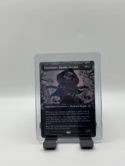 MTG, Tinybones, Bauble Burglar NM 324 (Borderless) Foundations Regular - Image 1