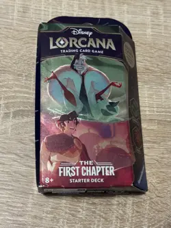 The First Chapter Ruby & Emerald Disney Lorcana TCG Starter Deck Cruella Aladdin 4050368981707 - Image 1