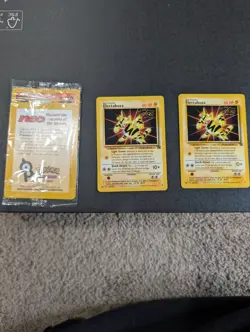 Sealed 2001 Entei Reverse Holo Pokemon Neo Discovery and Electabuzz WOTC Promo - Image 1