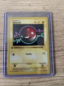 Pokemon Voltorb Base Set Trading Card 1999 1st Edition - Image 1