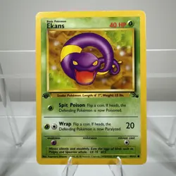 1st Edition Ekans 46/62 Fossil Pokemon Card - Image 1