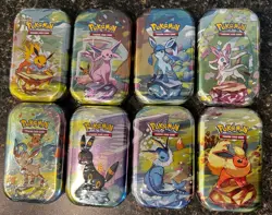 Pokemon TCG Scarlet & Violet Prismatic Evolutions Mini Tins Set of 8, Sealed - Image 1