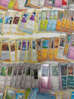 Large Pokemon Card Bundle with Tin - 300+ Cards Mixed Types & Trainers - Image 5