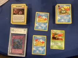 Pokemon & Yu-Gi-Oh! 1st Edition Card Lot - Dust Tornado, Krabby, Omanyte - Image 1