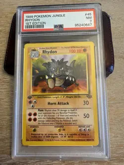 Pokemon TCG Rhydon Jungle 1st Edition Uncommon Card 45/64 PSA 7 NM - Image 1