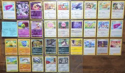 Pokemon GO Pokemon Card Lot: 31 cards (Mewtwo V, Melmetal, Tyranitar, Blissey) - Image 1