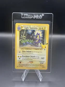 Pokemon TCG Light Toxtricity SWSH137 Celebrations Black Star Promo Holo - Image 1