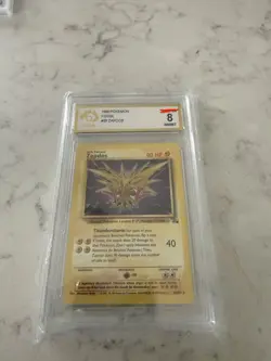 1999 POKEMON FOSSIL #30 ZAPDOS - Image 1