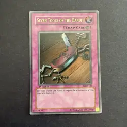 NM Seven Tools of the Bandit MRD-129 (Yu-Gi-Oh / English TCG / 1st Edition) - Image 1