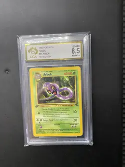 ARBOK Fossil 1ST EDITION Pokemon Card 31/62 CGA 8.5 - Image 1