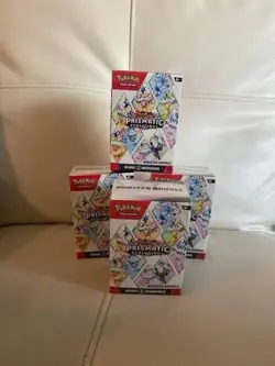 Pokemon Prismatic Evolutions 4X Booster Bundle - Image 1